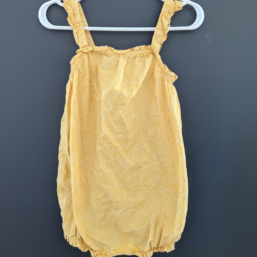 Yellow bubble romper with white pattern
